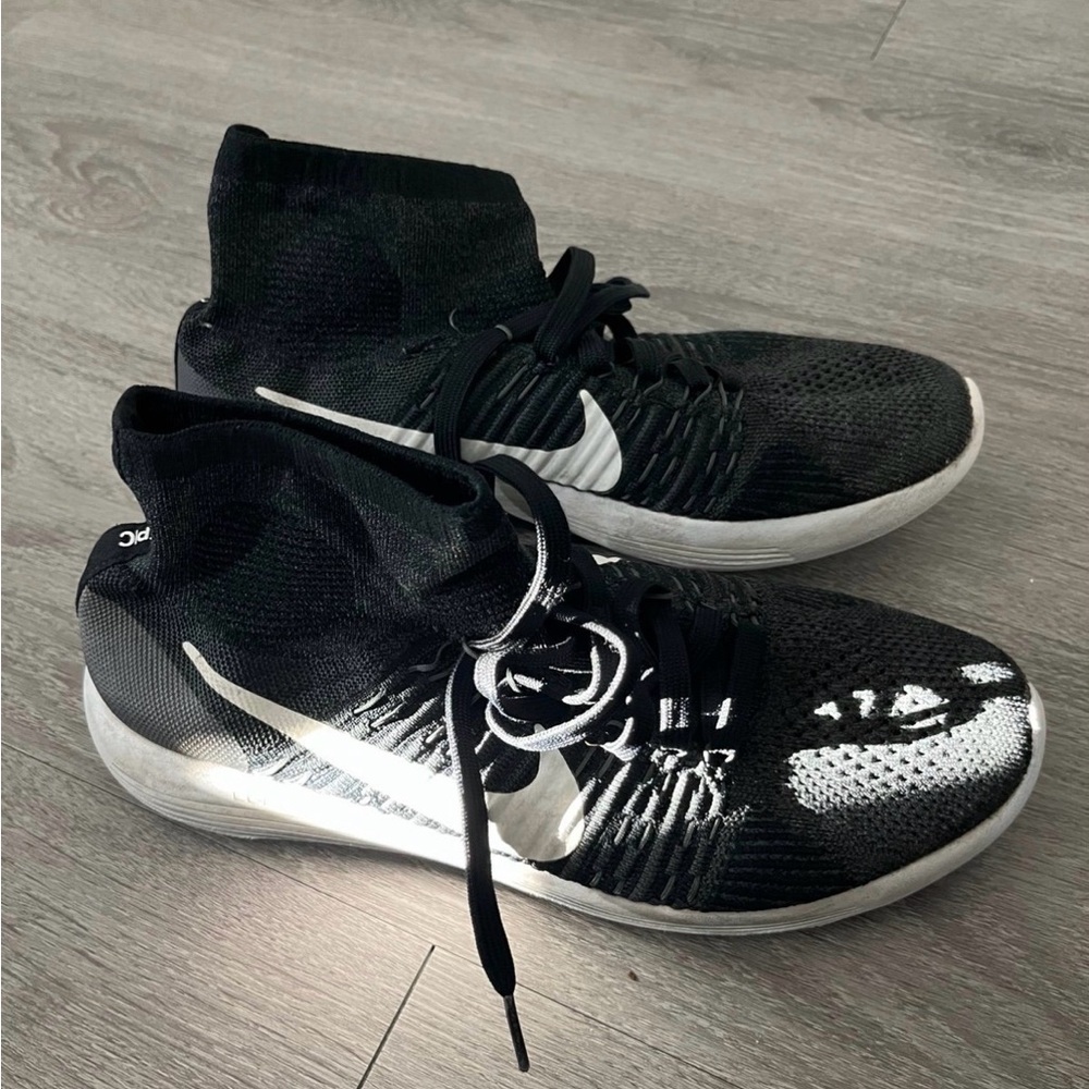 Nike Black & White Flyknit Mid-Top Sneakers